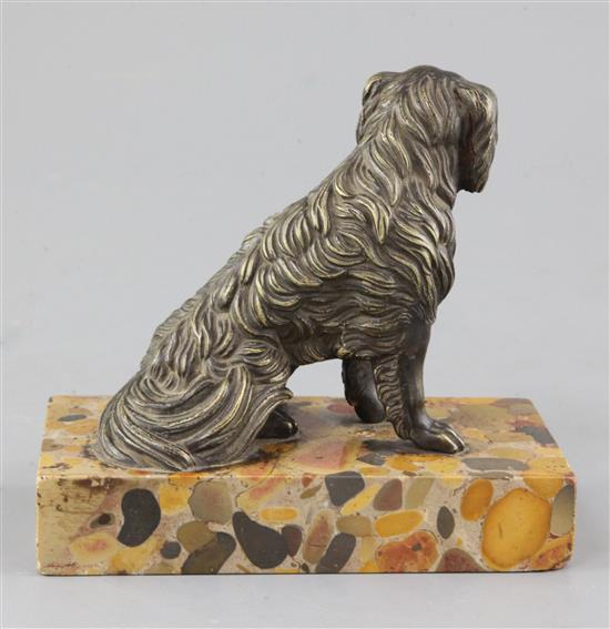 A Victorian bronze model of a seated spaniel, height 5.5in.